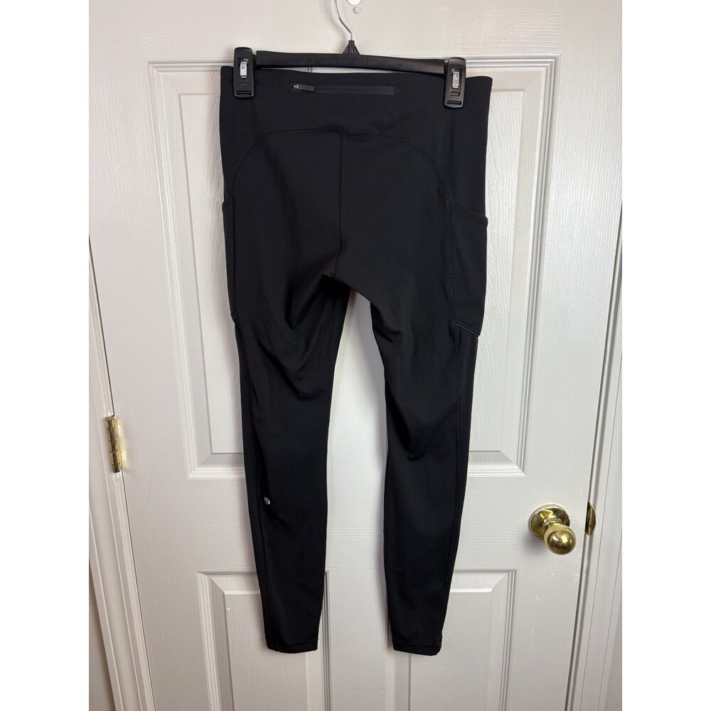 Lululemon Speed Up Pockets Size 8 Black Leggings Logo on Leg - 423